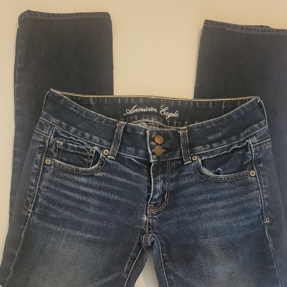 American Eagle Outfitters Blue Artist Stretch Jeans with Distressed Look. Size 2